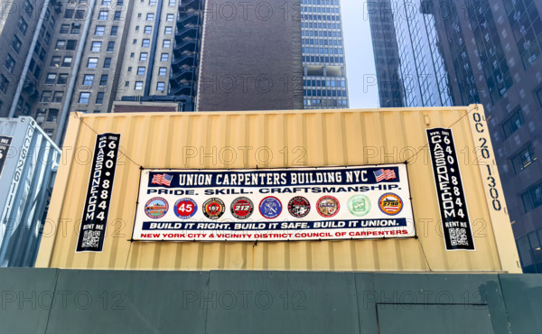 Union Carpenters Building NYC banner hanging on building exterior wall, Manhattan, New York City