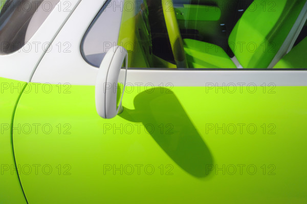 Side mirror detail on bright green 1999 Ford 021C Concept Car