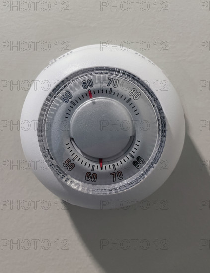 Old-fashioned Wall thermostat
