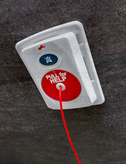 Pull for Help' medical emergency device on bathroom wall in hospital