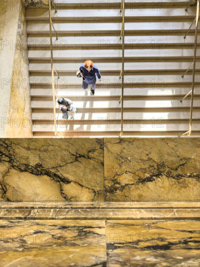 High angle view of two people walking down staircase, Boston Public Library, Boston