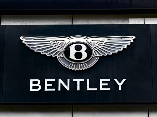 Bentley logo on car showroom building exterior, Manhattan, New York City
