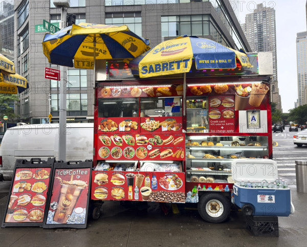 Food and drink cart on city street, New York City