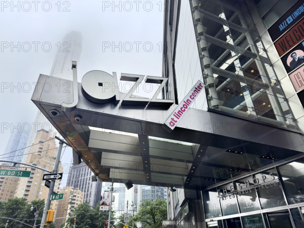 Jazz at Lincoln Center sign attached to awning  at entrance to The Shops at Columbus Circle, Manhattan, New York City