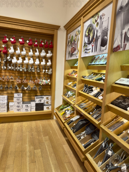 Assortment of kitchen utensils on display shelves, New York City