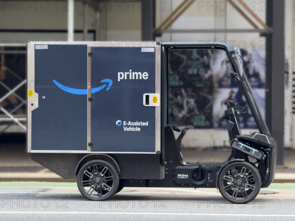 Amazon electric-assisted cargo bike parked on street, Manhattan, New York City