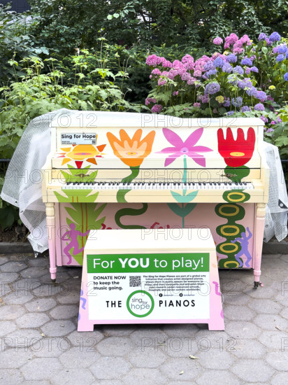 Artist-designed upright piano with painted flowers, Sing For Hope, Madison Square Park, Manhattan, New York City
