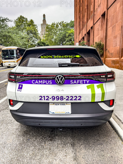 New York University electric car and street scene, New York City