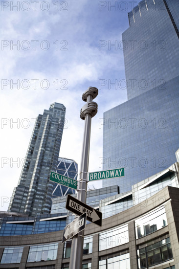 Low angle view of cityscape at Columbus Circle and Broadway, New York City