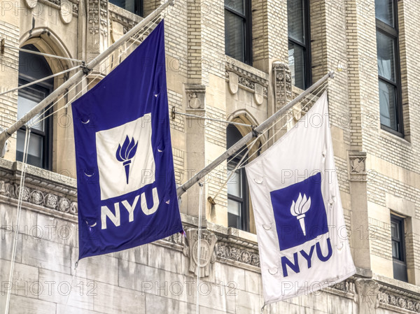 Two NYU flags flying above entrance to Frederick Loewe Theatre, New York University, 35 West 4th Street, Greenwich Village, Manhattan, New York City, New York, USA