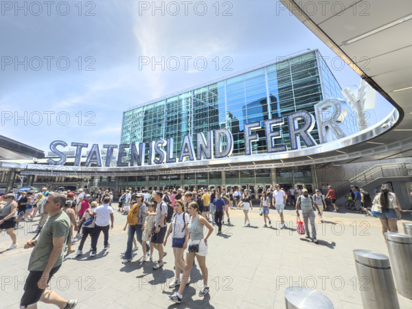 Crowd of people at Staten Island Ferry, Whitehall Terminal, 4 South Street, Financial District, Manhattan, New York City, New York, USA