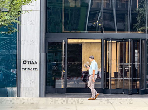 TIAA and Nuveen office building, building exterior and sidewalk scene, 730 Third Avenue, Manhattan, New York City, New York, USA