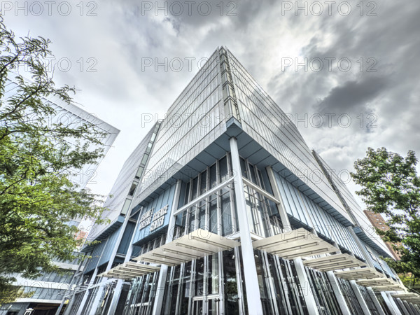 Jerome L. Greene Science Center, Columbia University, building exterior against ominous gray sky, low angle view, Manhattanville campus, 3227 Broadway, West Harlem, Manhattan, New York City, New York, USA