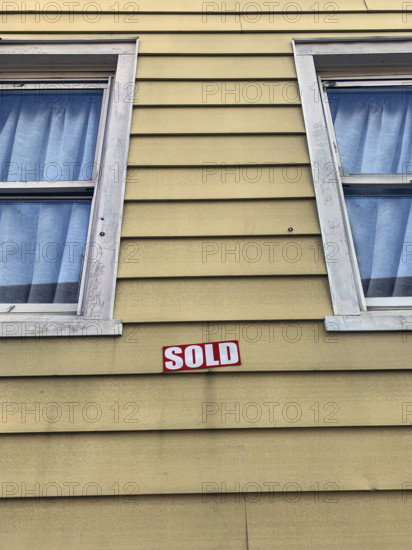 Sold Sign Posted on House, Brooklyn, New York, USA