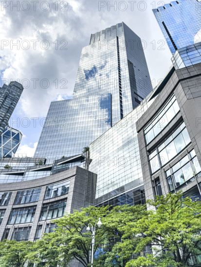 Deutsche Bank Center, building exterior to the left, Mandarin Oriental Hotel, building exterior to the right, The Shops at Columbus Circle in foreground, Manhattan, New York City, New York, USA