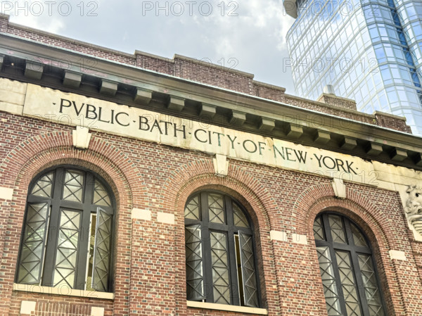Gertrude Ederle Recreation Center, formerly a public bathhouse, building exterior with inscription Public Bath City of New York, 232 West 60th Street, Manhattan, New York City, New York, USA