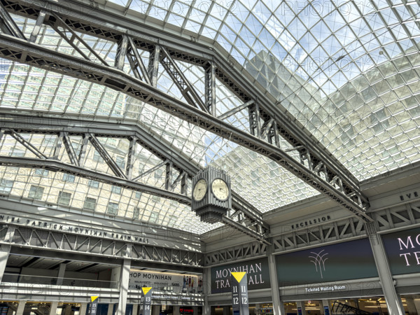 Skylight and hanging 4-sided clock above passenger concourse, Moynihan Train Hall, Pennsylvania Station, Manhattan, New York City, New York, USA