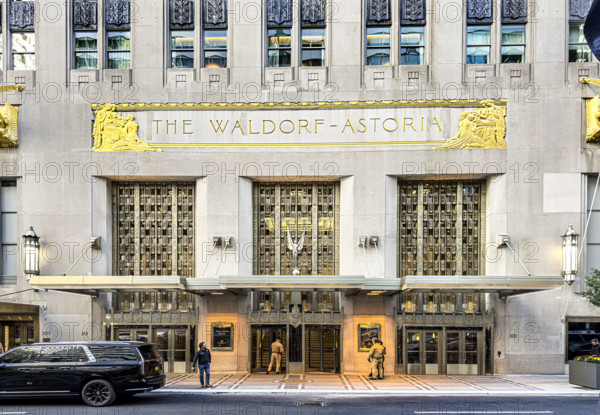 Waldorf Astoria, luxury hotel and condominium residence, building exterior detail and street scene, 301 Park Avenue, Manhattan, New York City, New York, USA