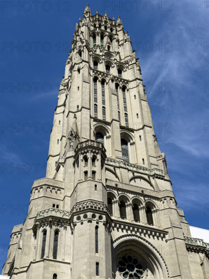 Riverside Church, exterior detail of tower against blue sky, Morningside Heights, Manhattan, New York City, New York, USA