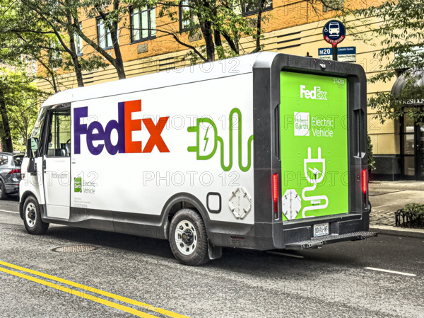 Federal Express electric delivery truck and street scene, Manhattan, New York City, New York, USA