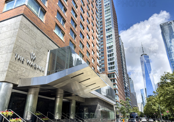 The Wagner Hotel, building exterior with view of One World Trade Center in background, 2 West Street, Tribeca, Manhattan, New York City, New York, USA