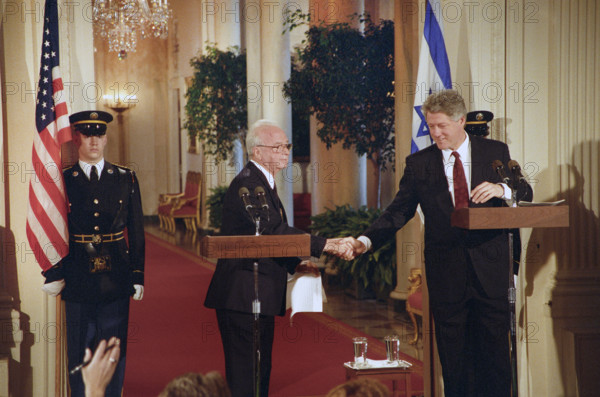 U.S. President Bill Clinton shaking hands with Israeli Prime Minister Yitzhak Rabin during press conference, East Room, White House, Washington, D.C., USA, Bob McNeely, White House Photographer, March 15, 1993
