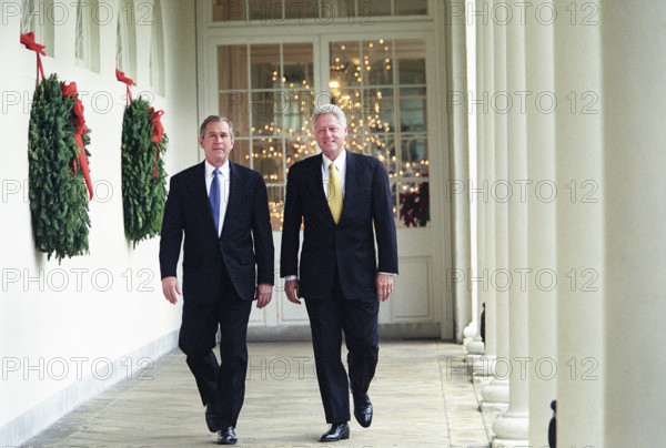 U.S. President Bill Clinton and U.S. President-Elect George W. Bush walking through White House, Washington, D.C., USA, David Scull, White House Photographer, December 19, 2000