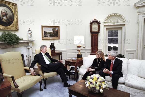 U.S. President Bill Clinton meeting with American Actress Jane Fonda and American media entrepreneur Ted Turner in the Oval Office of the White House, Washington, D.C., USA, Bob McNeely, White House Photographer, March 17, 1993
