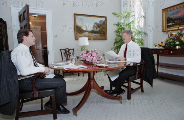 U.S. President Bill Clinton and U.S. Vice President Al Gore participating in their first "working" lunch in oval office study, White House, Washington, D.C., USA, Bob McNeely, White House Photographer, January 26, 1993