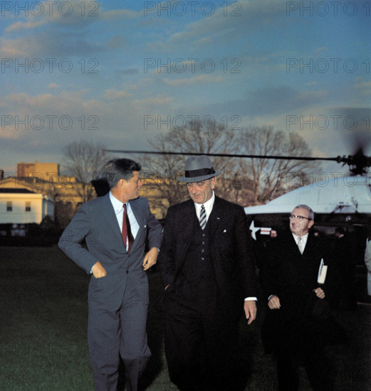 U.S. President John F. Kennedy greeting U.S. Vice President Lyndon Johnson upon his return from his trip to Senegal, Washington, D.C., USA, Robert Knudsen, White House Photographs, April 7, 1961