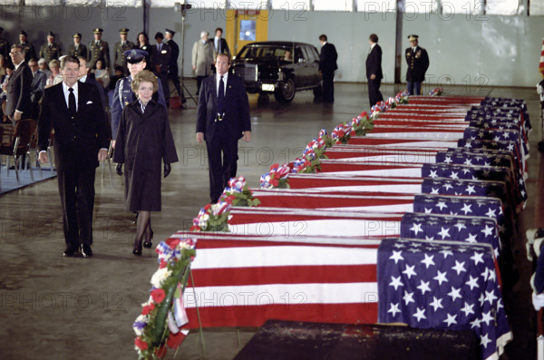 U.S. President Ronald Reagan and Nancy Reagan honoring the victims of the bombing of the U.S. Embassy in Beirut, Lebanon at Andrews Air Force Base, Prince George's County, Maryland, USA, President Ronald Reagan White House Photographic Office, April 23, 1983