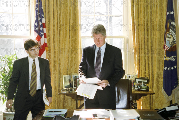 U.S. President Bill Clinton meeting with White House Communications Director George Stephanopoulos in the Oval Office, White House, Washington, D.C., USA, Bob McNeely, White House Photographer, February 25, 1993
