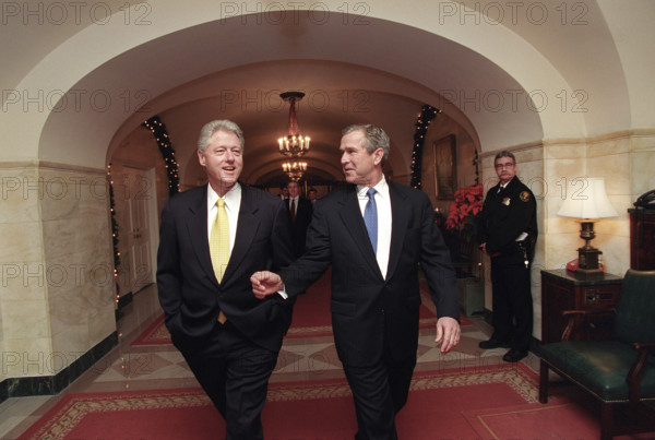 U.S. President Bill Clinton and U.S. President-Elect George W. Bush walking through White House, Washington, D.C., USA, David Scull, White House Photographer, December 19, 2000