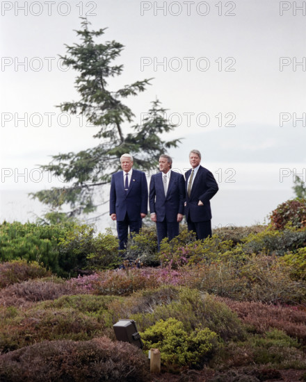 U.S. President Bill Clinton with Russian President Boris Yeltsin and Canadian Prime Minister Brian Mulroney outside the University of British Columbia President's residence during trilateral meeting, Vancouver, British Columbia, Canada, Bob McNeely, White House Photographer, April 3, 1993