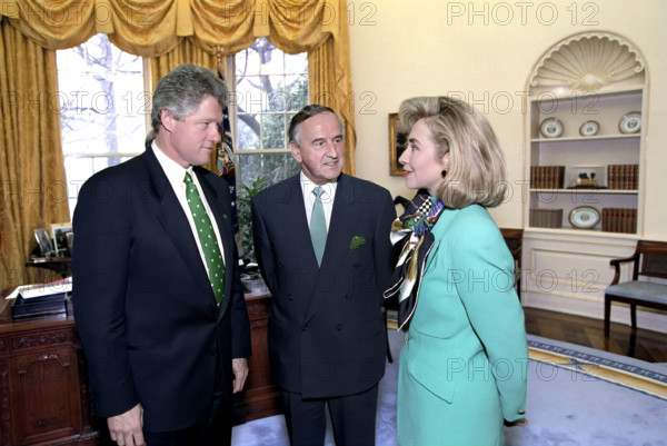 U.S. President Bill Clinton and U.S. First Lady Hillary Clinton meeting with Irish Prime Minister Albert Reynolds in the Oval Office of the White House, Washington, D.C., USA, Bob McNeely, White House Photographer, March 17, 1993