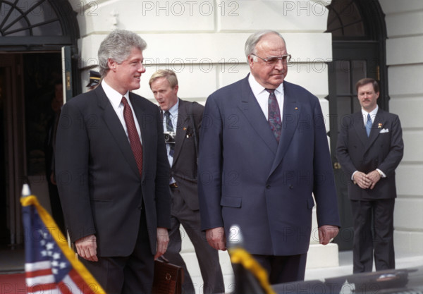 U.S. President Bill Clinton and German Chancellor Helmut Kohl walking out of  the White House, Washington, D.C., USA, Barbara Kinney, White House Photographer, March 26, 1993