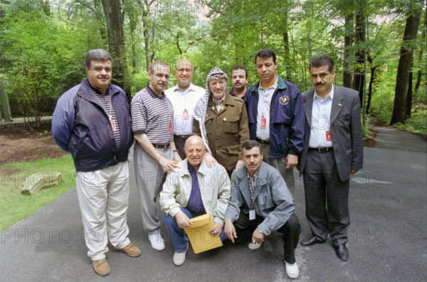 Palestinian Authority Chairman Yasser Arafat and the Palestinian delegation at Camp David during the Israeli/Palestinian Summit, Frederick County, Maryland, USA, David Scull, White House Photographer, July 20, 2000