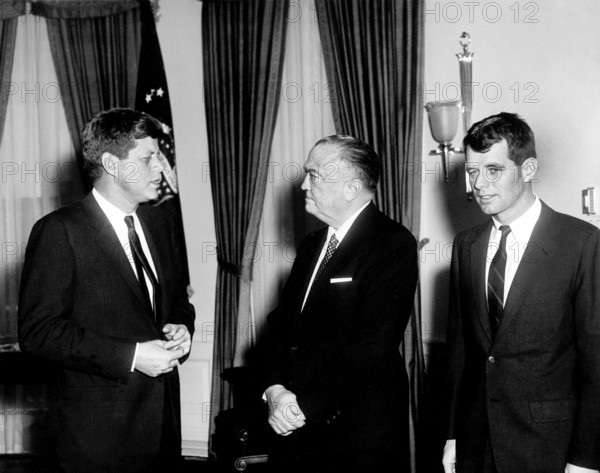 U.S. President John F. Kennedy with U.S. Attorney General Robert Kennedy (right) and FBI Director J. Edgar Hoover (center) in the oval office of the White House, Washington, D.C., USA, Abbie Rowe, White House Photographs, February 23, 1961