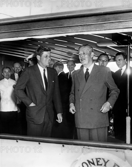 U.S. President John F. Kennedy with British Prime Minister Harold MacMillan on the Presidential yacht "Honey Fitz" following afternoon meetings on the Potomac River, Washington, D.C., USA, Abbie Rowe, White House Photographs, April 6, 1961