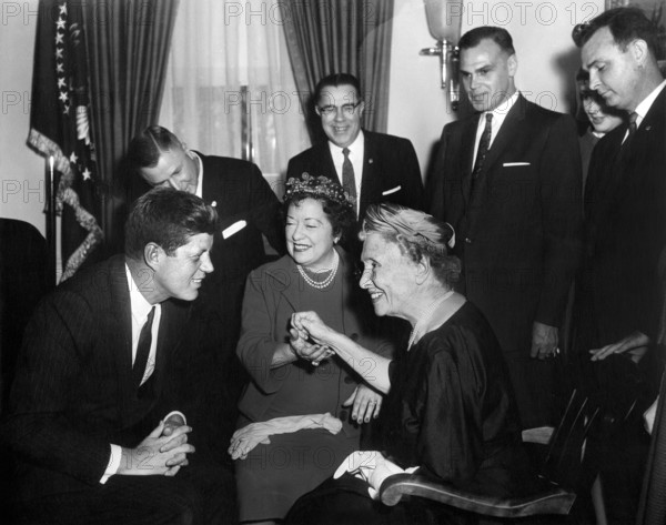 U.S. President John F. Kennedy meeting with Helen Keller (seated right), as her personal secretary Evelyn Seide (seated left) and members of the Lions Clubs International look on, White House, Washington, D.C., USA, Abbie Rowe, White House Photographs, April 8, 1961