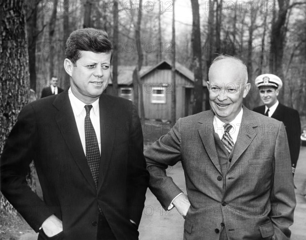 U.S. President John F. Kennedy with former U.S. President Dwight D. Eisenhower, Camp David, Frederick County Maryland, USA, Abbie Rowe, White House Photographs, April 22, 1961