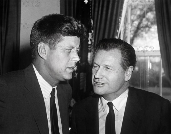 U.S. President John F. Kennedy talking with Governor of New York Nelson Rockefeller in the Oval Office, White House, Washington, D.C., USA, Abbie Rowe, White House Photographs, April 25, 1961
