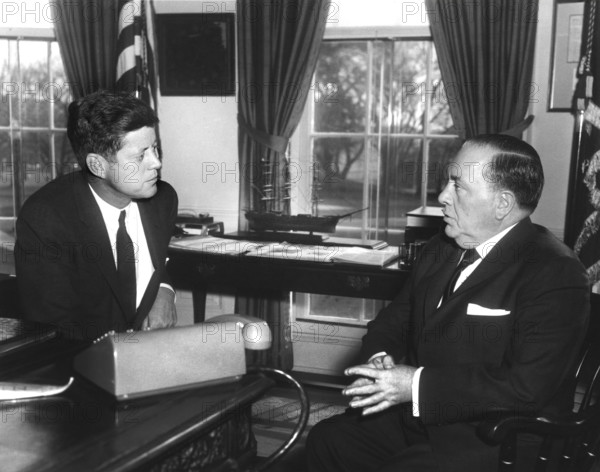 U.S. President John F. Kennedy meeting with Mayor Richard J. Daley of Chicago in the Oval Office of the White House, Washington, D.C., USA, Abbie Rowe, White House Photographs, January 20, 1962