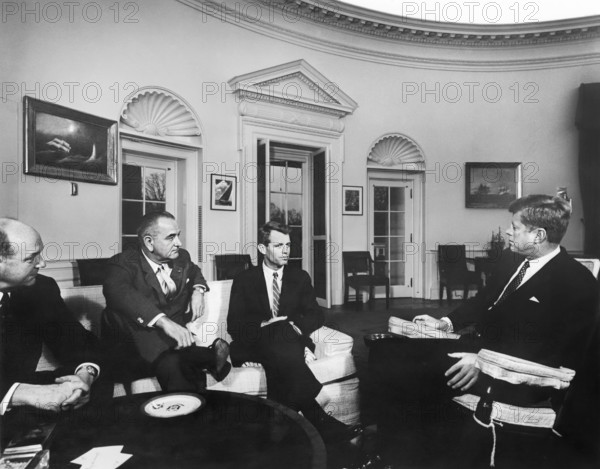 U.S. Secretary of State Dean Rusk, U.S. Vice President Lyndon B. Johnson, U.S. Attorney General Robert F. Kennedy and U.S. President John F. Kennedy meeting following the Attorney General's trip to Asia and Europe, Oval Office, White House, Washington, D.C., USA, Abbie Rowe, White House Photographs, February 28, 1962