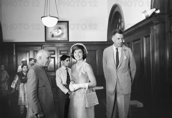 U.S. First Lady Jacqueline Kennedy and  U.S. Ambassador to India John Kenneth Galbraith (right) visiting with Prime Minister of India Jawaharlal Nehru (left) at the Prime Minister’s residence, Teen Murti Bhavan, New Delhi, India, Cecil Stoughton, White House Photographs, March 13, 1962