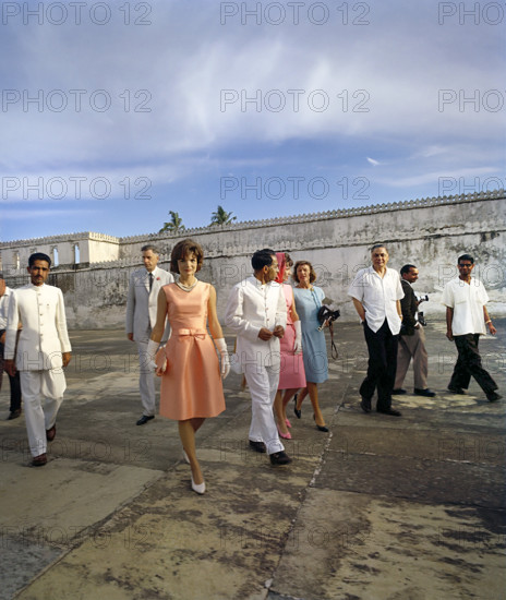 U.S. First Lady Jacqueline Kennedy, U.S. Ambassador to India John Kenneth Galbraith (background), Maharana of Udaipur, Bhagwat Singh, Mrs. Kennedy’s sister, Princess Lee Radziwill of Poland, Washington hostess Joan Braden and  Indian Ambassador to the United States B.K. Nehru touring island palace of Jag Mandir on Lake Pichola, Udaipur, Rajasthan, India, Cecil Stoughton, White House Photographs, March 17, 1962