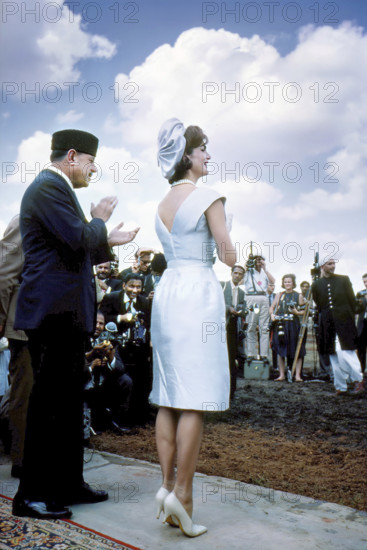 U.S. First Lady Jacqueline Kennedy (center) and President of Pakistan Mohammad Ayub Khan (left) attending Ninth Annual Pakistani National Horse and Cattle Show, Fortress Stadium, Lahore, Punjab, Pakistan, Cecil Stoughton, White House Photographs, March 22, 1962