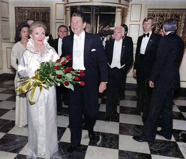 U.S. President Ronald Reagan and U.S. First Lady Nancy Reagan arriving at the Kennedy Center Inaugural Ball, Washington, D.C., USA, President Ronald Reagan White House Photographic Office, January 20, 1981