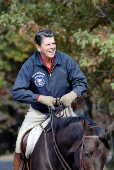 U.S. President Ronald Reagan horseback riding, Camp David, Frederick County, Maryland, USA, President Ronald Reagan White House Photographic Office, October 10, 1981
