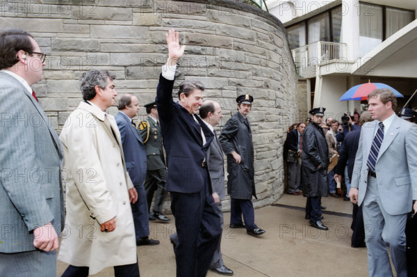 U.S. President Ronald Reagan waving to crowd outside Hilton Hotel shortly before assassination attempt, Washington, D.C., USA, President Ronald Reagan White House Photographic Office, March 30, 1981